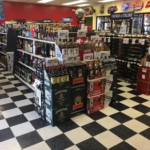 a checkerboard floor in a liquor store