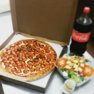 Family Night Special
Large two topping pizza, large Garden Salad and a 2 liter of soda