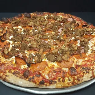 Meat Eater Pizza 
Comes with Pepperoni, Ham, Bacon Bits, Italian Sausage and chopped up Meatballs