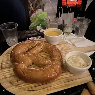 Giant pretzel with awesome dipping sauces (beer cheese and mustard)
