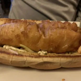a fish sandwich with french fries