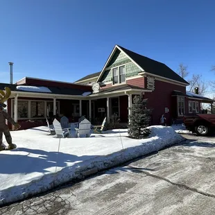a man standing in front of a house
