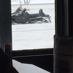 a snowmobile in the background