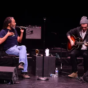 two musicians on stage