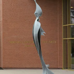 Ex Astris (1978). The 14-foot, brass-plated sculpture by Louisville artist Tom Lear is located at the main entrance to the Newlin Hall foyer