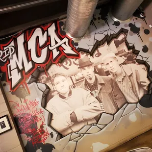 a mural of the mca gang