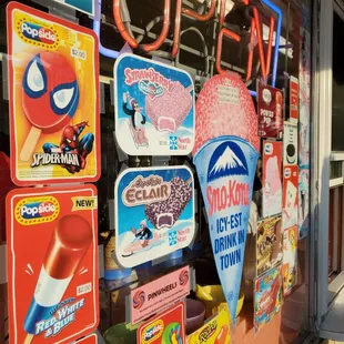 a store window with various signs