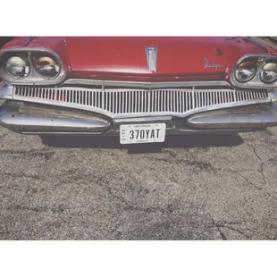 the front end of a classic car