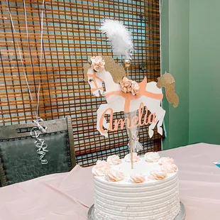 a cake with a horse topper