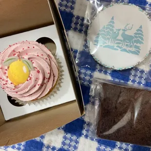 Walnut brownie, sugar cookie, lemon cupcake with raspberry buttercream