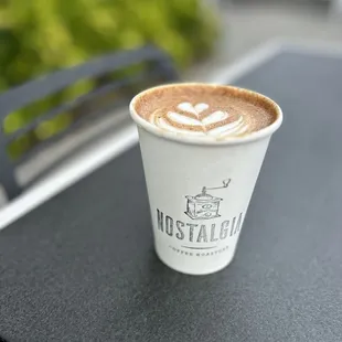 Mocha Latte with dark chocolate and whole milk. They also have an option for spicy dark chocolate like a Mexican Mocha.