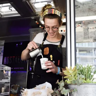 Taylor pouring some latte art!