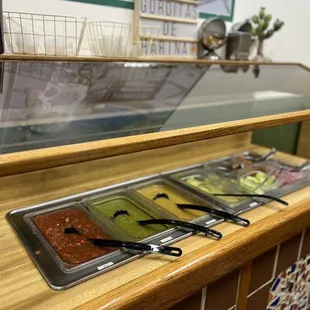 a buffet with a variety of condiments