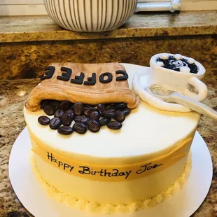 a birthday cake with coffee beans