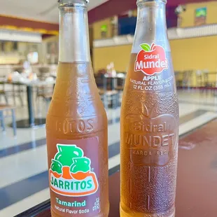 two bottles of orange juice