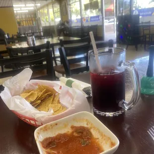 Comped chips, salsa. Jamaica Aqua Fresca (3.99)