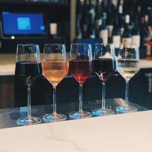 a row of wine glasses