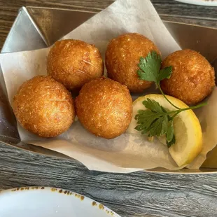 Saganaki fritters. I already squeezed the lemon so trying to hide the squeeze.