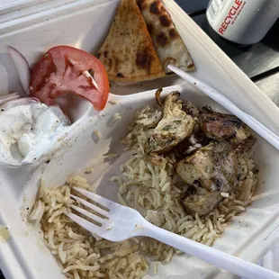 Marinated chicken plate, half eaten because I was so hungry!