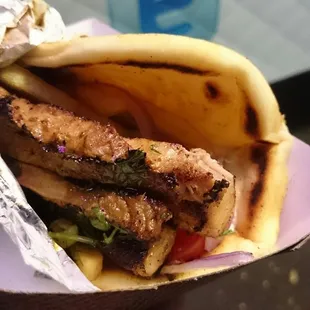 Masterful roast pork belly in gyro form