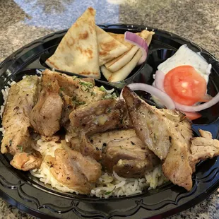Chicken basmati platter with pita bread. Sooooo yummy!