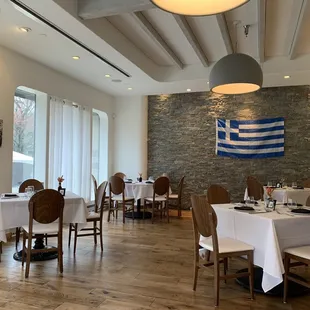 a dining room with tables and chairs