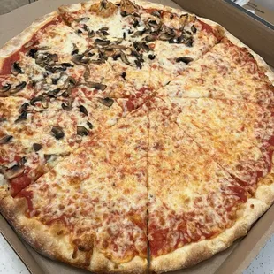 Large pie. 1/2 mushrooms. So good!