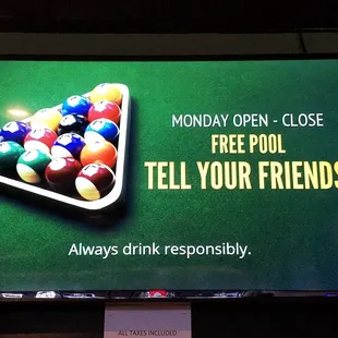 a pool table with billiards on it