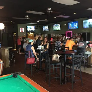 a pool table in a sports bar