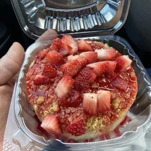 Crust on top and bottom and added strawberries to the top. Good cheesecake. Love to try the other flavors.
