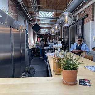 a man working in a coffee shop