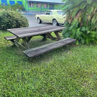 a picnic table in the grass