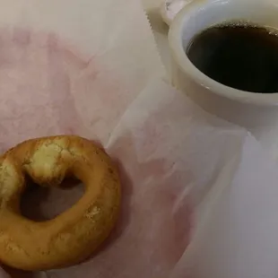 Old fashion donut and black coffee.