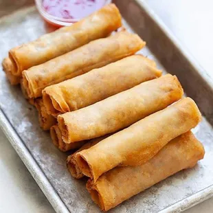 Lumpia ( Egg rolls) pork, chicken , veggie $13.50/ doz comes with home made sweet &amp; sour sauce