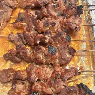 Meat skewers: Available in Pork and chicken $5.00/ stick