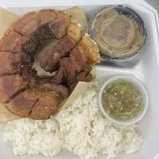 Deep fried Pork Belly Roll: marinated and seasoned with home made seasoning and tolled to keep the seasoning inside the roll. $18/plate