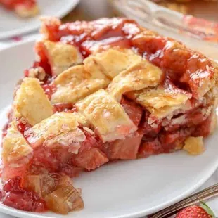 a slice of strawberry pie