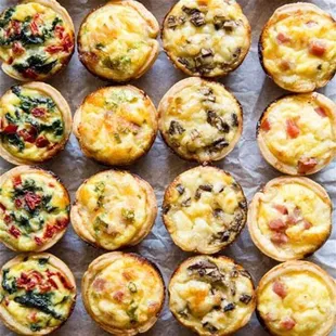 a variety of mini quiche