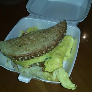 Half of a monster omelet taking home to eat later
