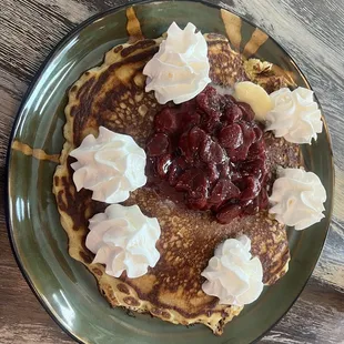 Pancake with strawberries and whip cream