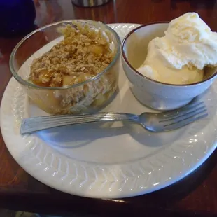 Apple crisp with ice cream.