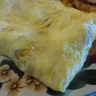 Meatlovers Omelette, close-up.