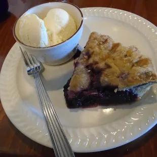 Blueberry ginger pie with ice cream.
