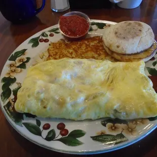 Meatlovers Omelette with hash browns &amp; English Muffin.