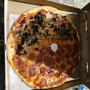 Half pepperoni, half black olive.  Not bad