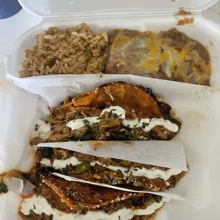 Parmesan enchilada taco chicken, ground turkey, and steak, with rice and beans