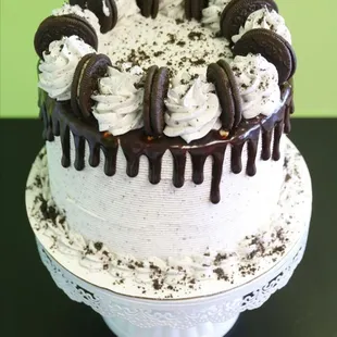 a cake with oreo cookies on top