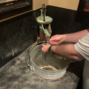 a man washing his hands