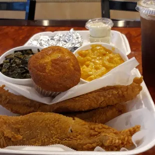 Catfish dinner with collard greens and mac and cheese sweet tea