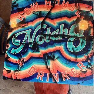 a table with a sign on it